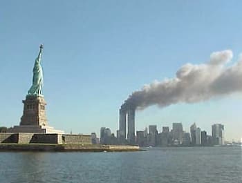 New York City travel planning photo showing September 11 attacks in New York City: View of the World Trade Center and the Statue of Liberty. (Image: US National Park Service)