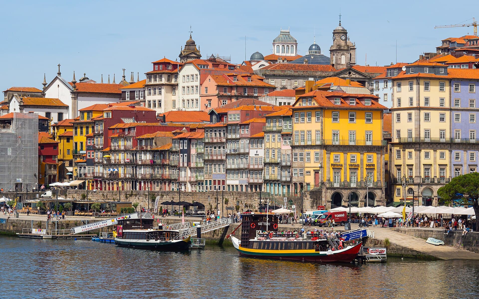 Porto travel planning photo showing colorful old town buildings along Porto's riverfront