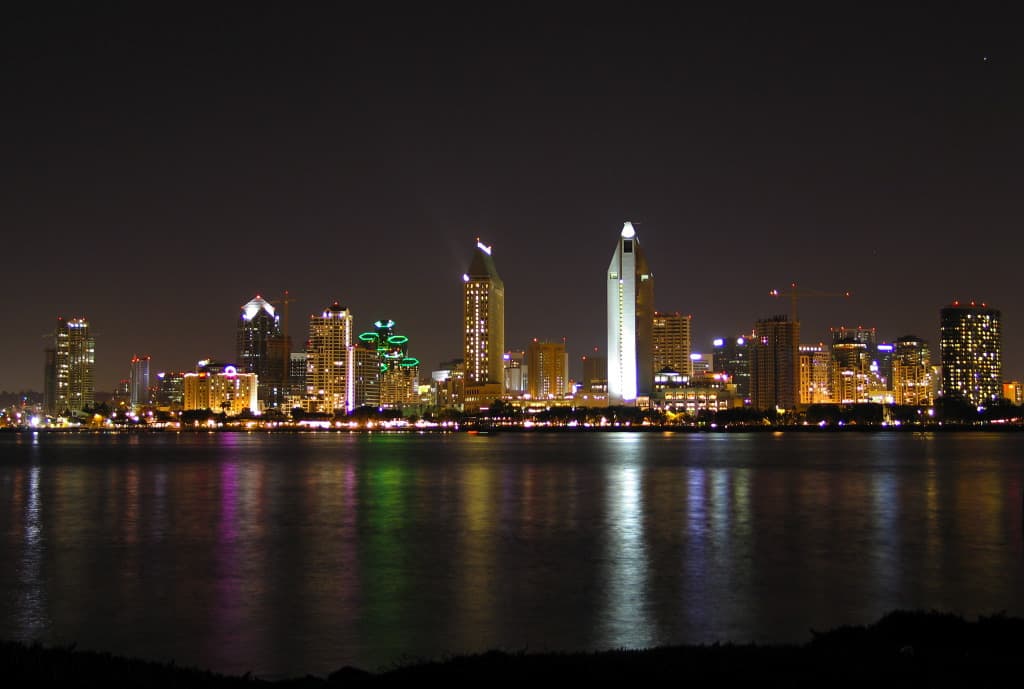 San Diego travel planning photo showing Downtown San Diego Skyline at night, viewed from Coronado towards Downtown, using: Aperture: f2.2 Shutter Speed: 4 sec Focal Length: 11.2 mm