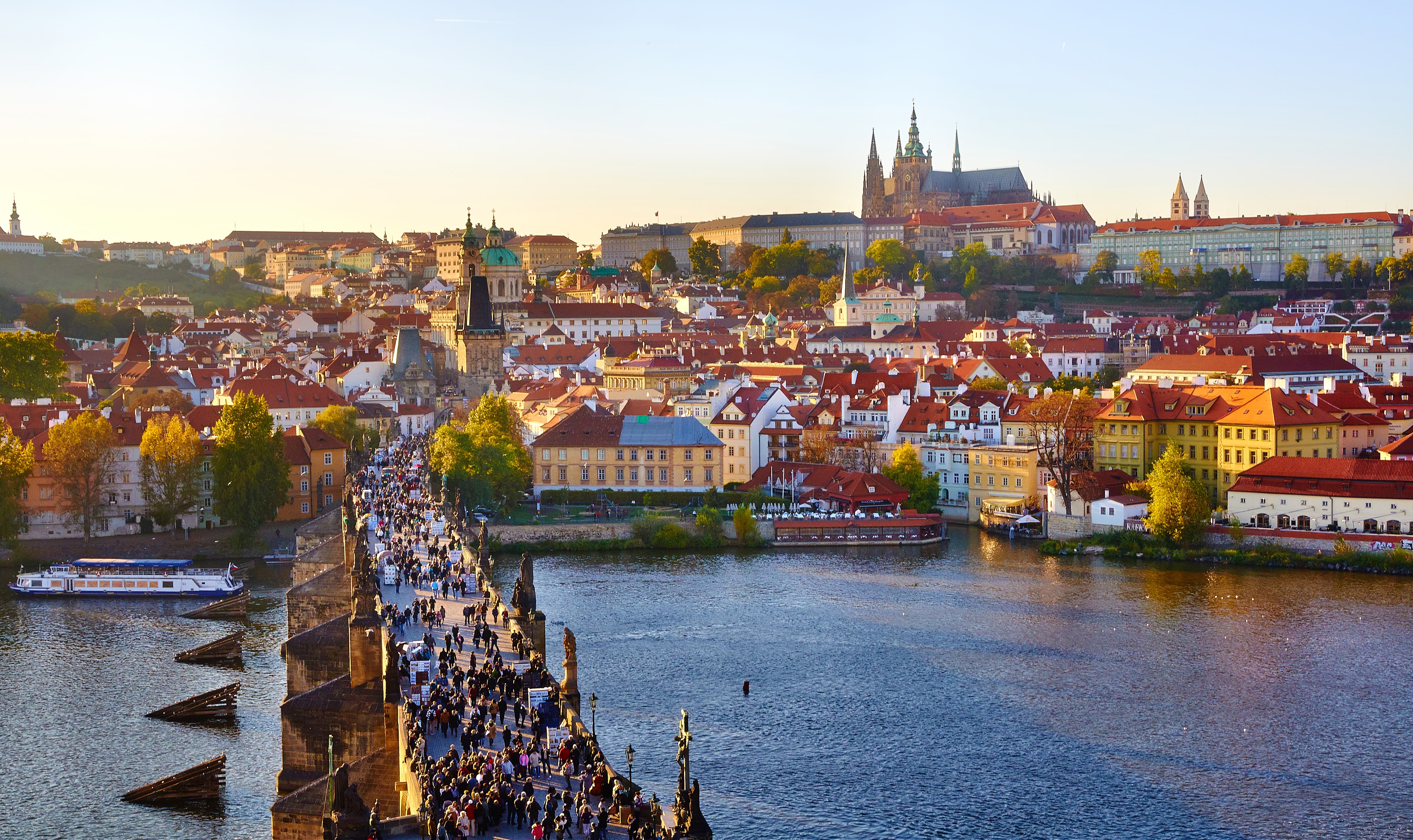 Prague skyline with historic rooftops and bridges along the Vltava