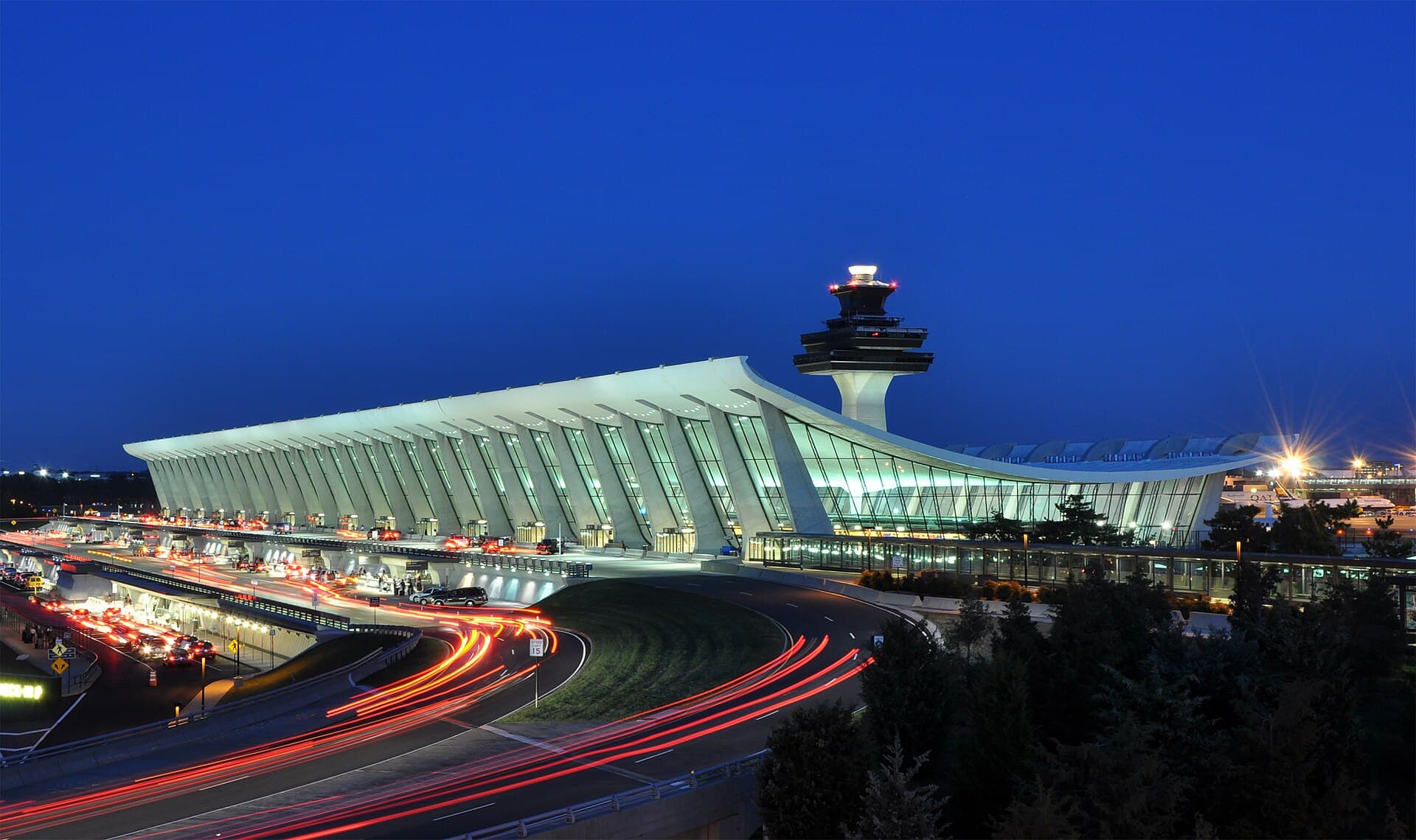 Washington DC travel planning photo showing Main Terminal of Washington Dulles International Airport at dusk in Virginia, USA